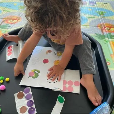 Child taking part in a Spanish activity at home